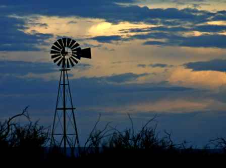 Windmill at sunset, west Texas